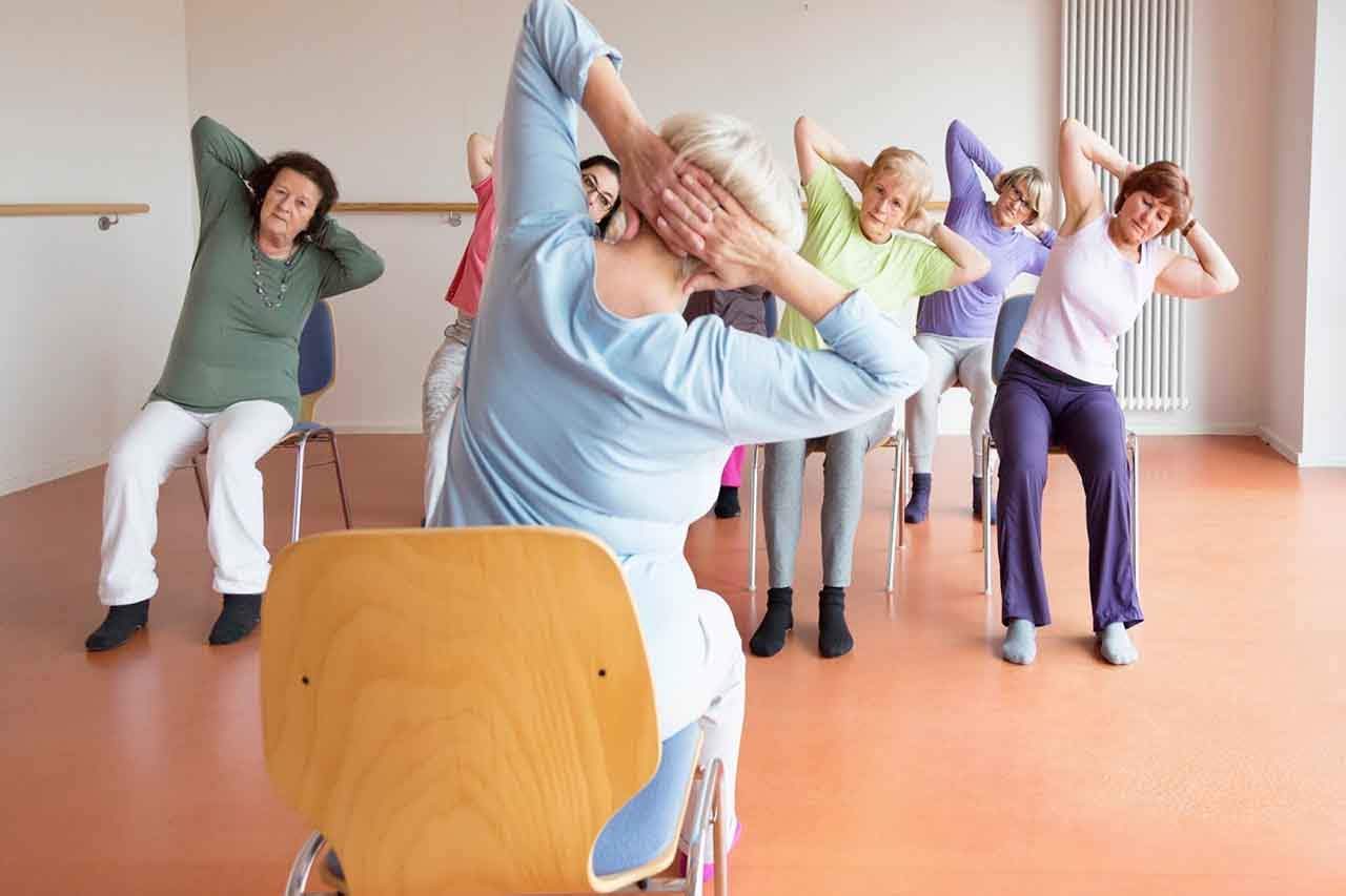 Read more about the article 6 Chair Yoga Poses You Can Do At Work Without Leaving Your Desk